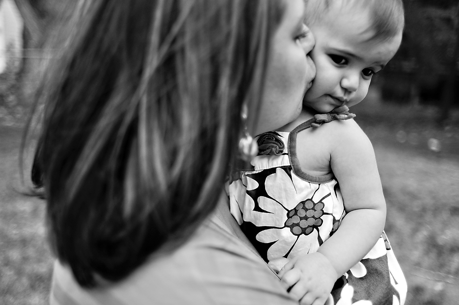 mommy kissing baby